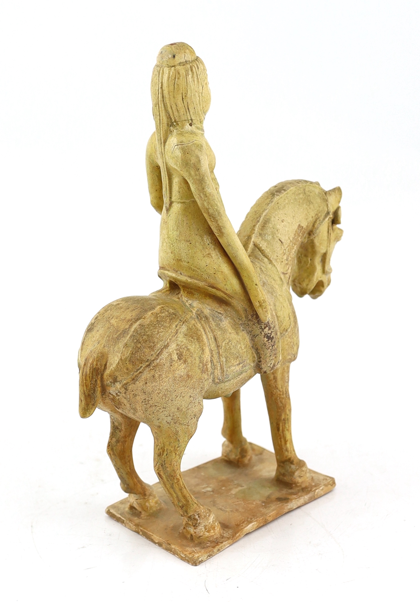 A Chinese straw glazed pottery model of a horse and female rider, Tang dynasty (618-906 AD)